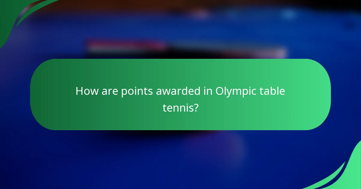 How are points awarded in Olympic table tennis?