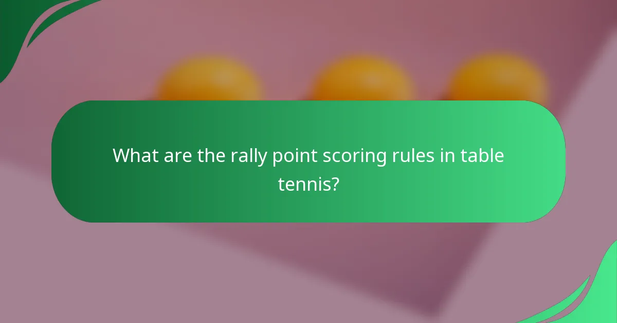 What are the rally point scoring rules in table tennis?
